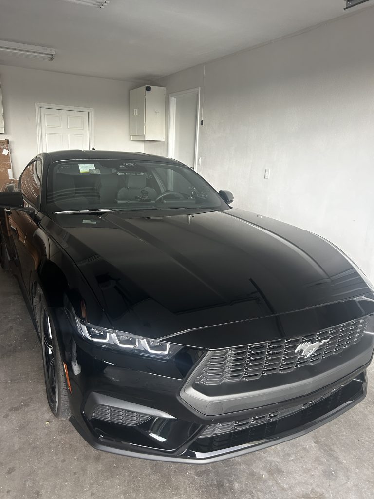 2024 Ford Mustang EcoBoost in the garage.