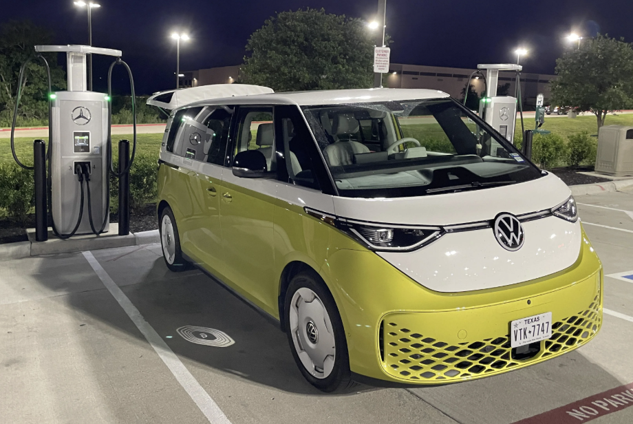 A VW Microbus EV charging up at the charge station.